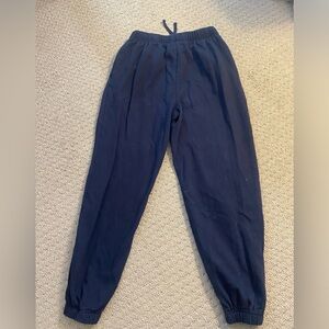 Navy blue cuffed sweatpants from garage.